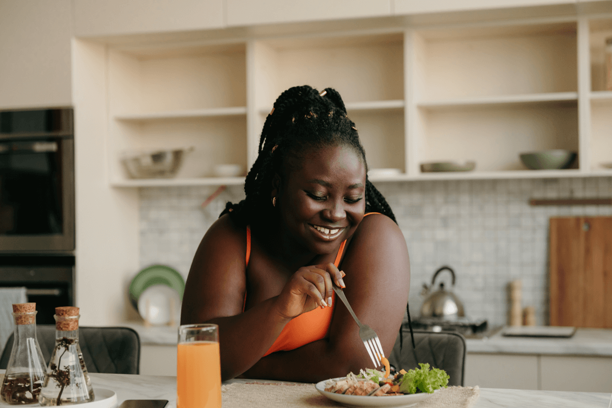 healthy young lady eating salad